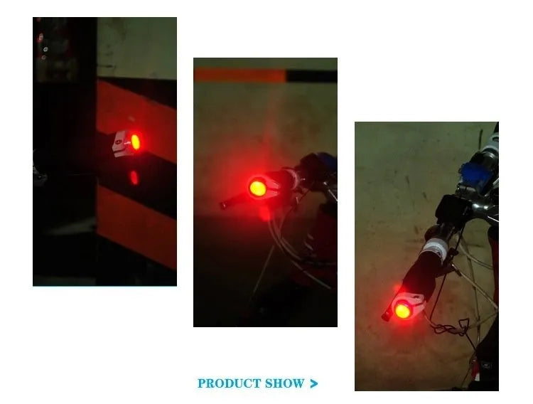 A pair of anodised aluminium bicycle handlebar safety lights in a choice of colours, showing the LED lens and mounting nut.