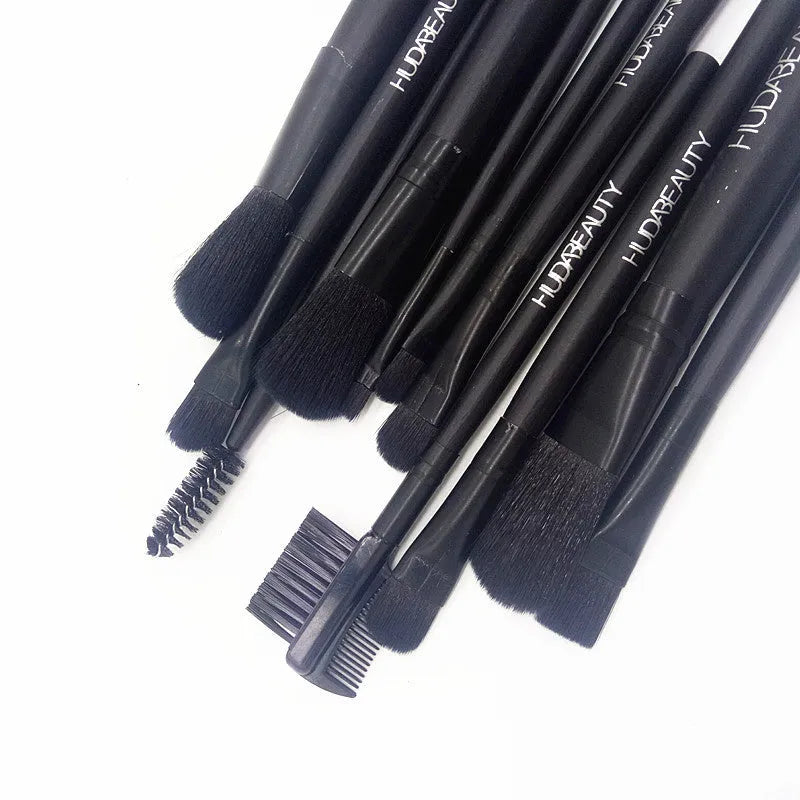 12-piece black makeup brush set in iron box with wooden handles and silk nylon bristles