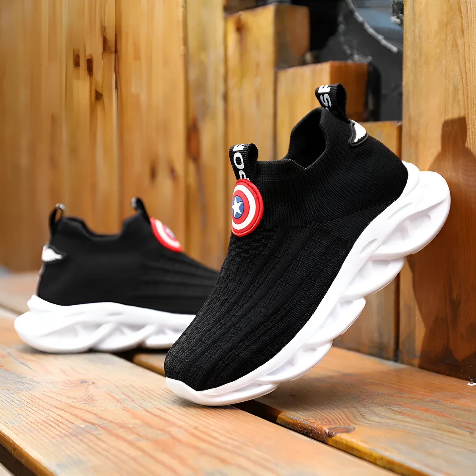Children's black and white knitted overshoes with MD soles for runway events