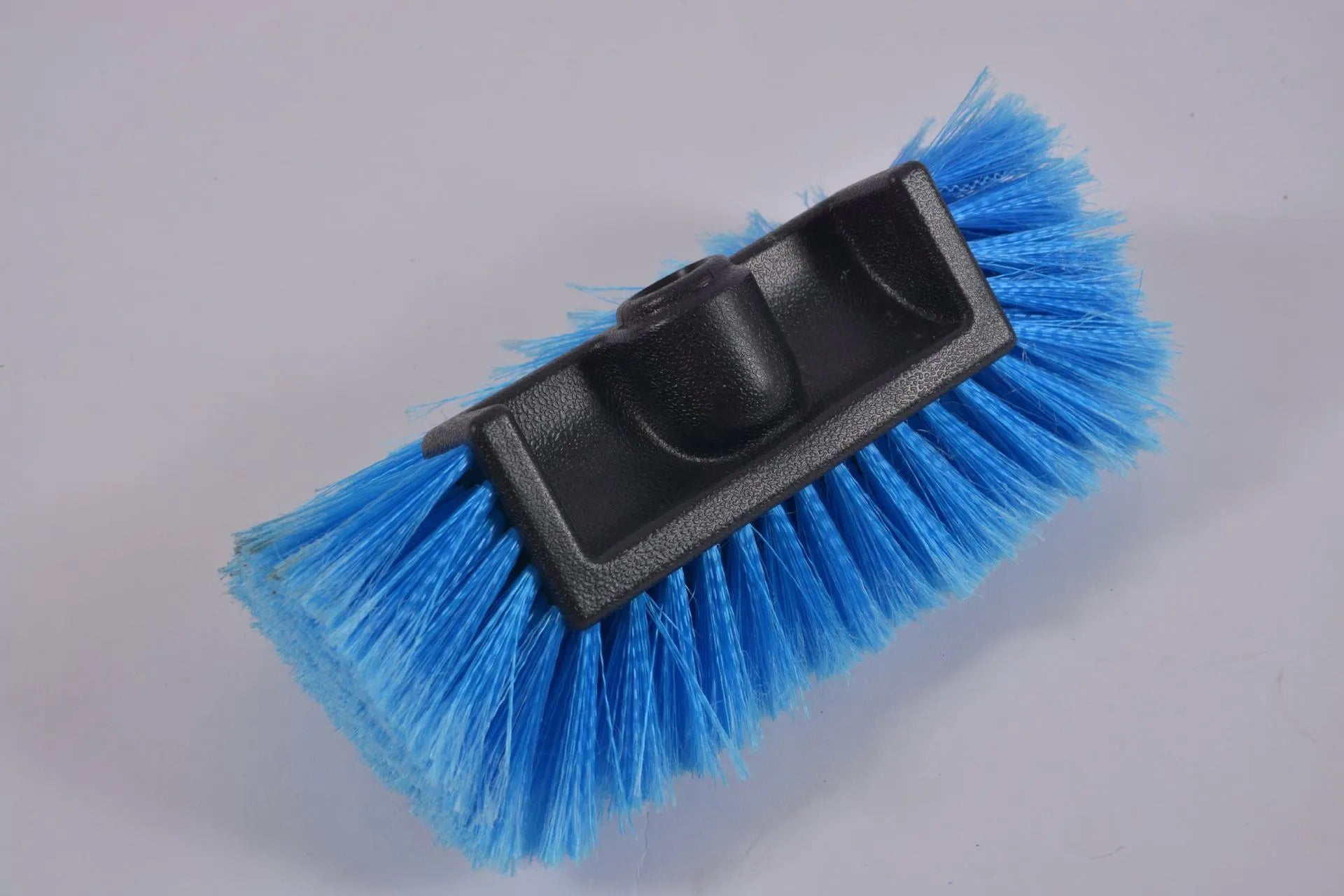 Portable car wash brush with telescopic rod and removable flow-through brush head in multiple colour options