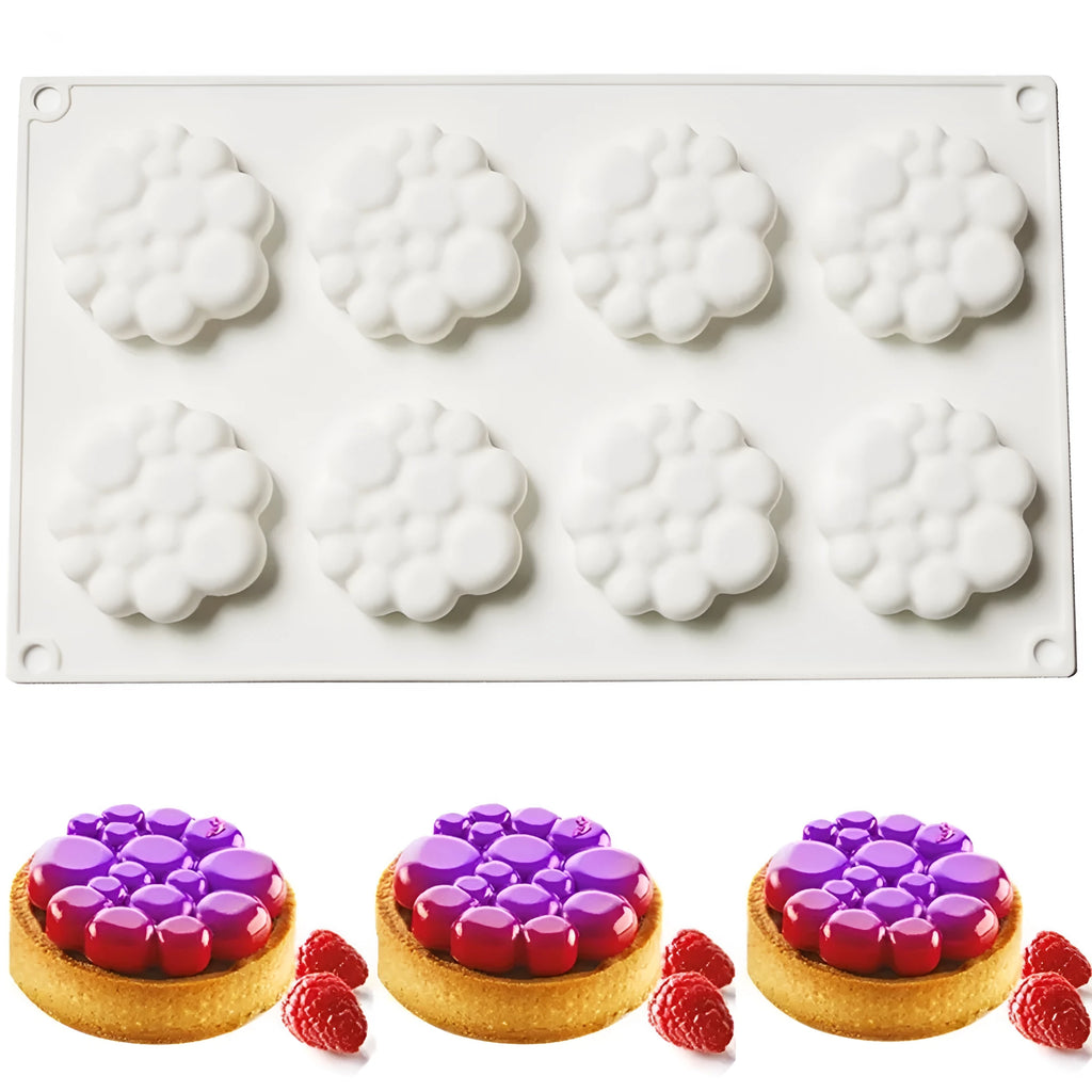 Round silicone cake mould with 8 raised bubble towers for tiered desserts.