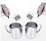 Silver handheld electric milk frother with double teat stainless steel whisk head on white background