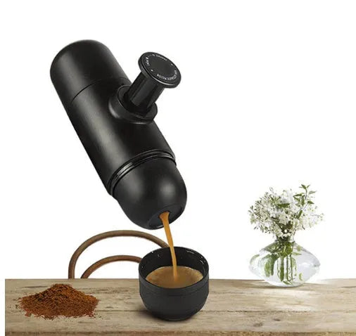 Black portable manual coffee machine measuring 6×17.5cm with stainless steel components