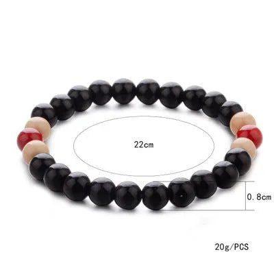 Natural stone bead bracelet with lava stones on a wrist