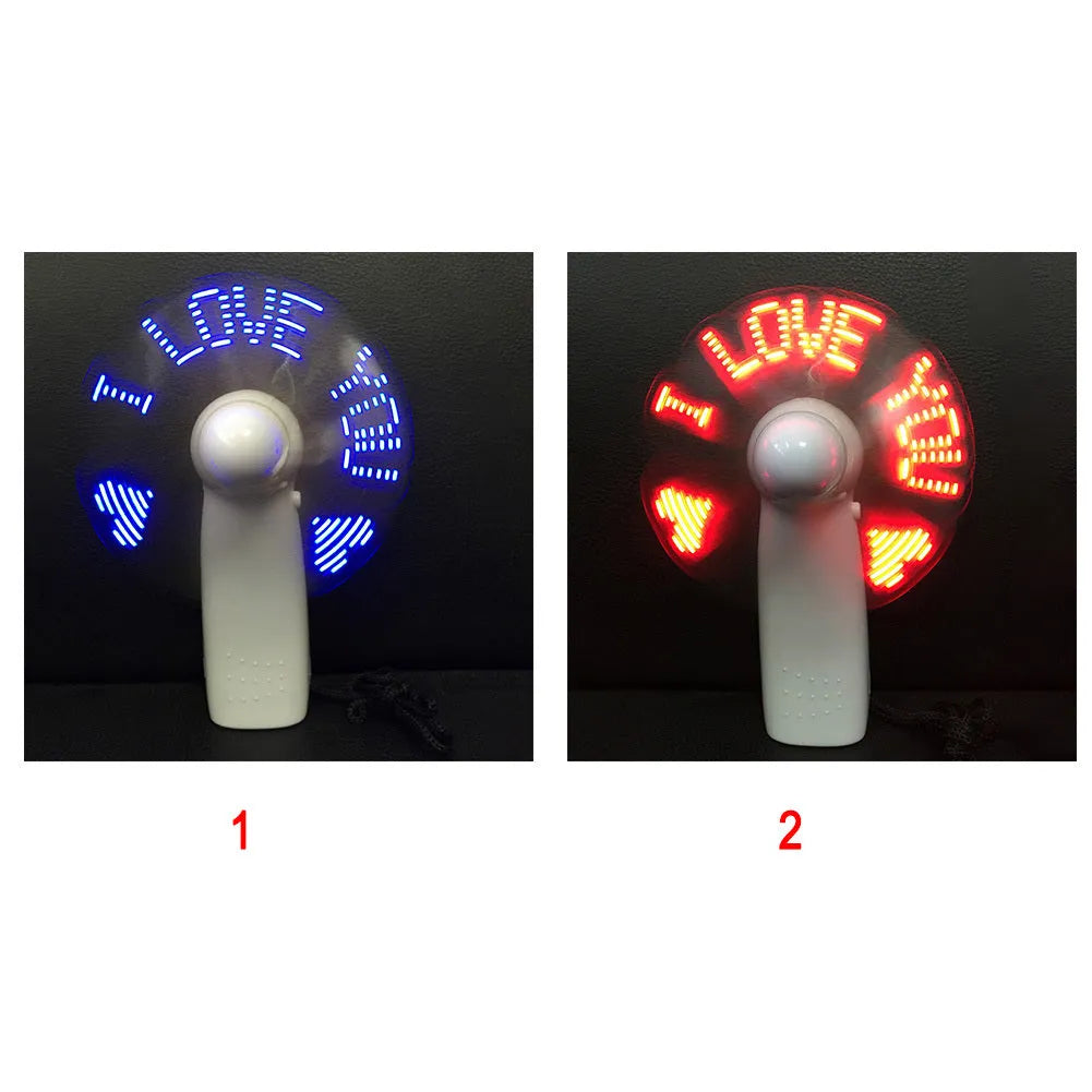White mini handheld fan with blue and red LED love pattern display, showing dimensions.