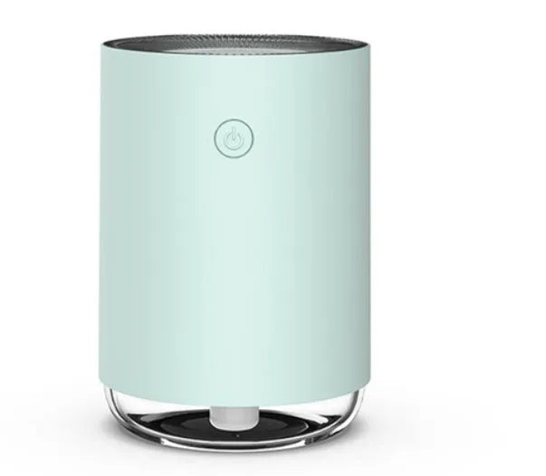 Green night light humidifier diffuser with coloured LED illumination and mist output