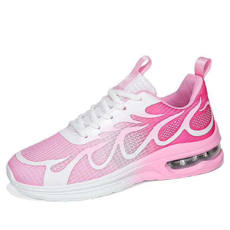 Women's pink mesh and PU sole casual sneaker shown from the side.