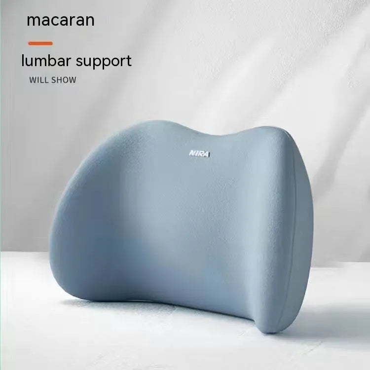 Black memory foam car lumbar support pillow and matching headrest pillow on a car seat.