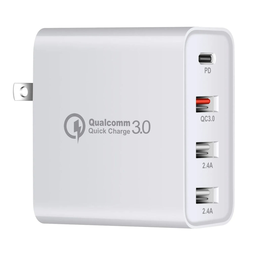 Black and white four-port USB-C wall charger with interchangeable UK, US, EU, and AU plug heads.