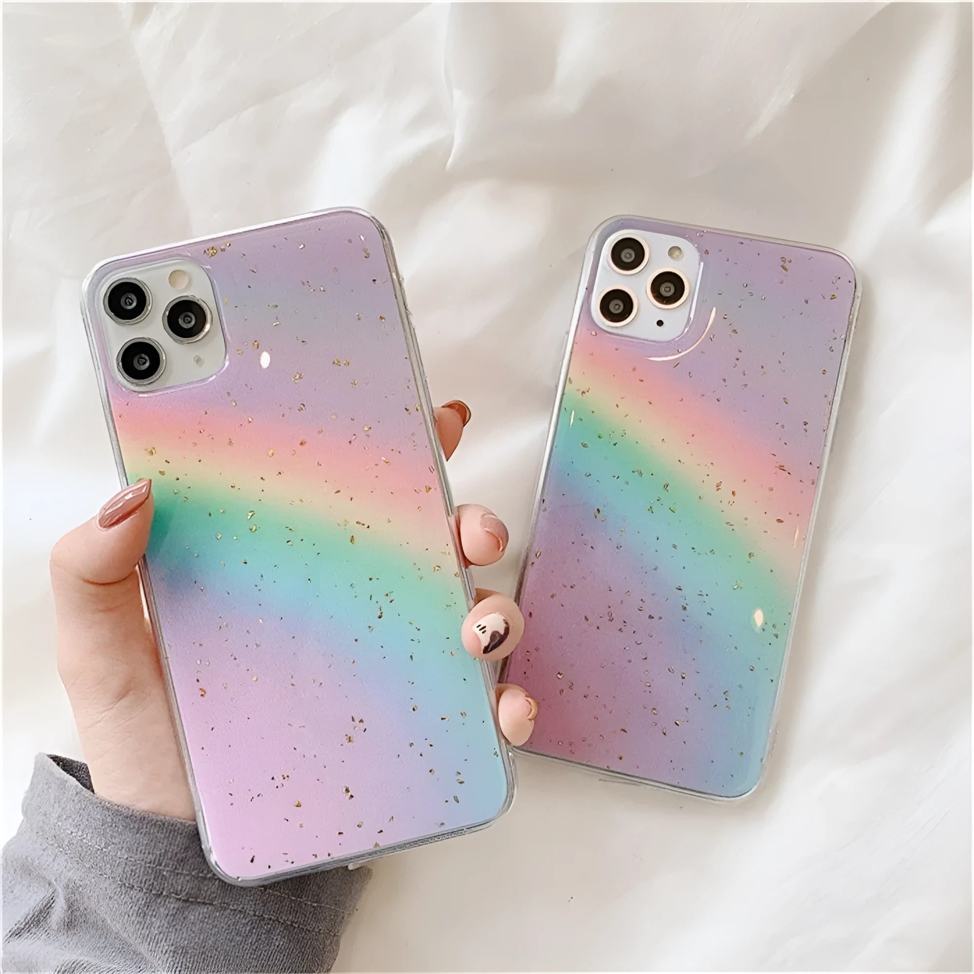 Rainbow gradient TPU phone case with striped design on an iPhone.