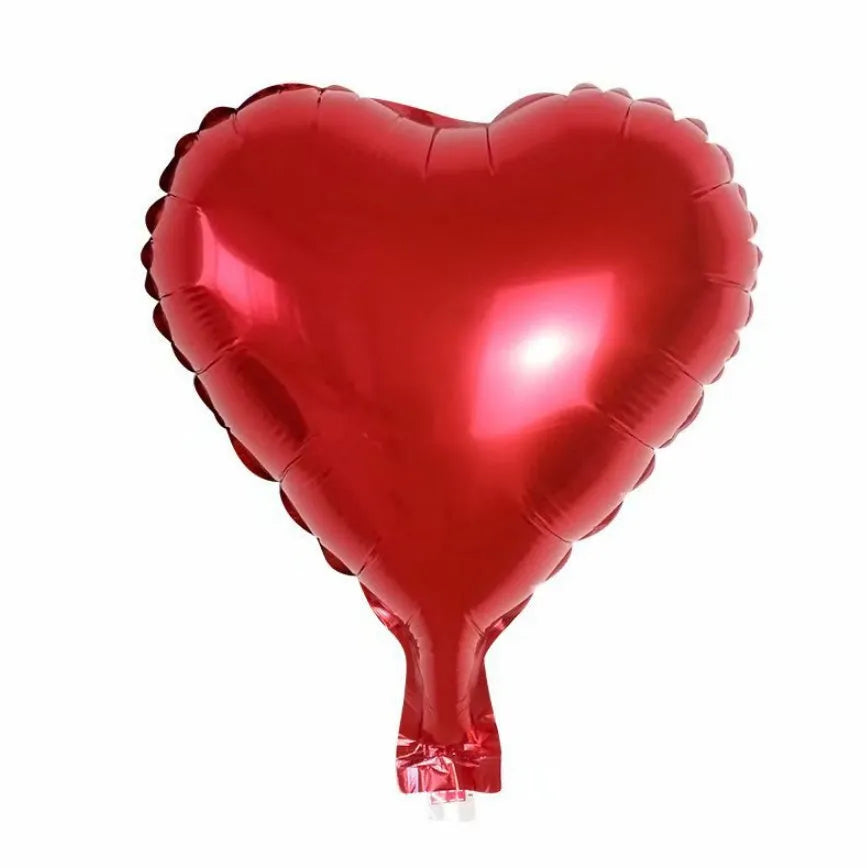 Five peach heart-shaped aluminium foil balloons in metallic colours for party decoration