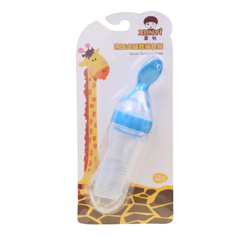 Clear disposable 18 oz paper drinking cup with a blue coloured lid on a table.