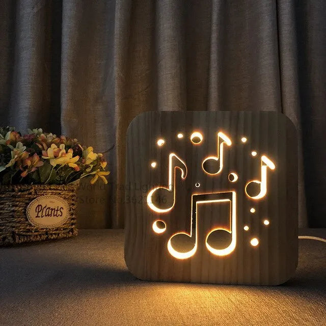 Square pine wood USB LED atmosphere lamp emitting warm white light on a table.