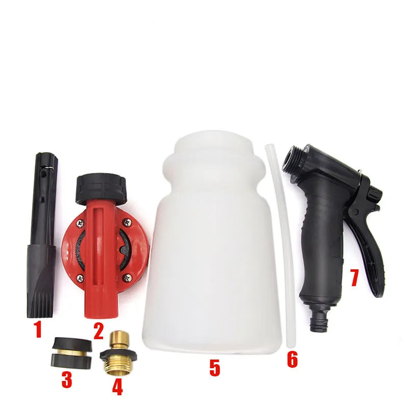 Green handheld foam pot high pressure water gun garden sprayer on a white background.