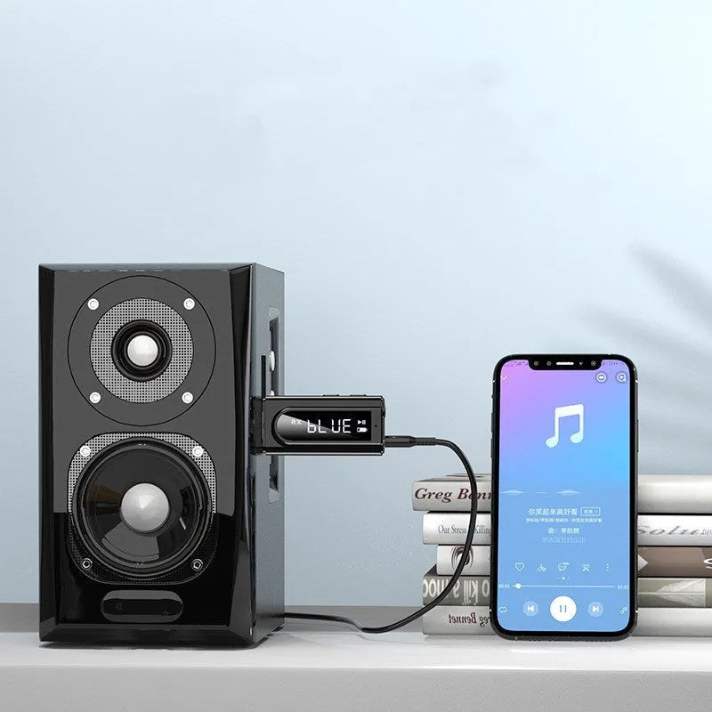 Black USB car FM Bluetooth receiver for wireless music streaming via AUX or USB.