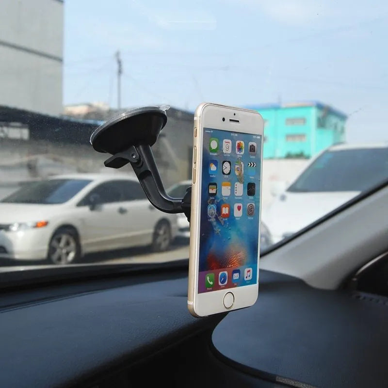 Black magnetic car phone holder with 360 rotation for dashboard mounting with iPhone and Samsung compatibility