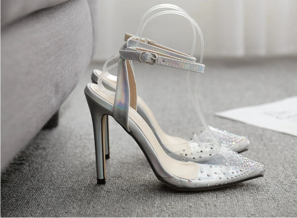 Women's pointed toe sandals with stiletto heel and diamond detail on the footbed.