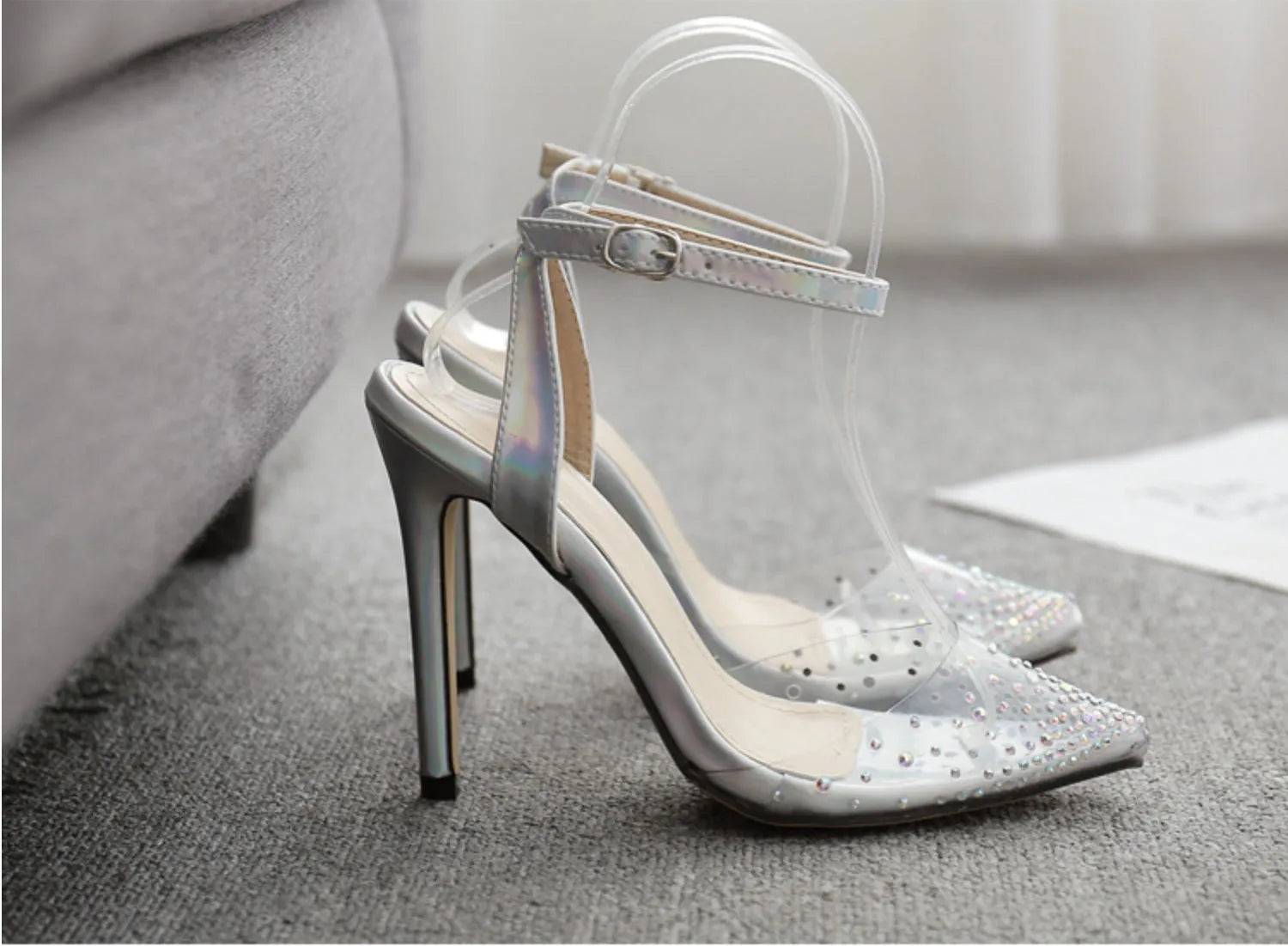 Women's pointed toe sandals with stiletto heel and diamond detail on the footbed.