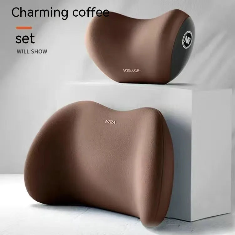 Black memory foam car lumbar support pillow and matching headrest pillow on a car seat.