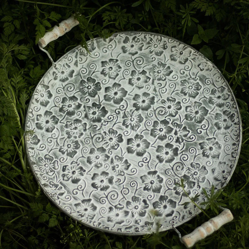 Round wrought iron storage tray in European style, shown in two size options.
