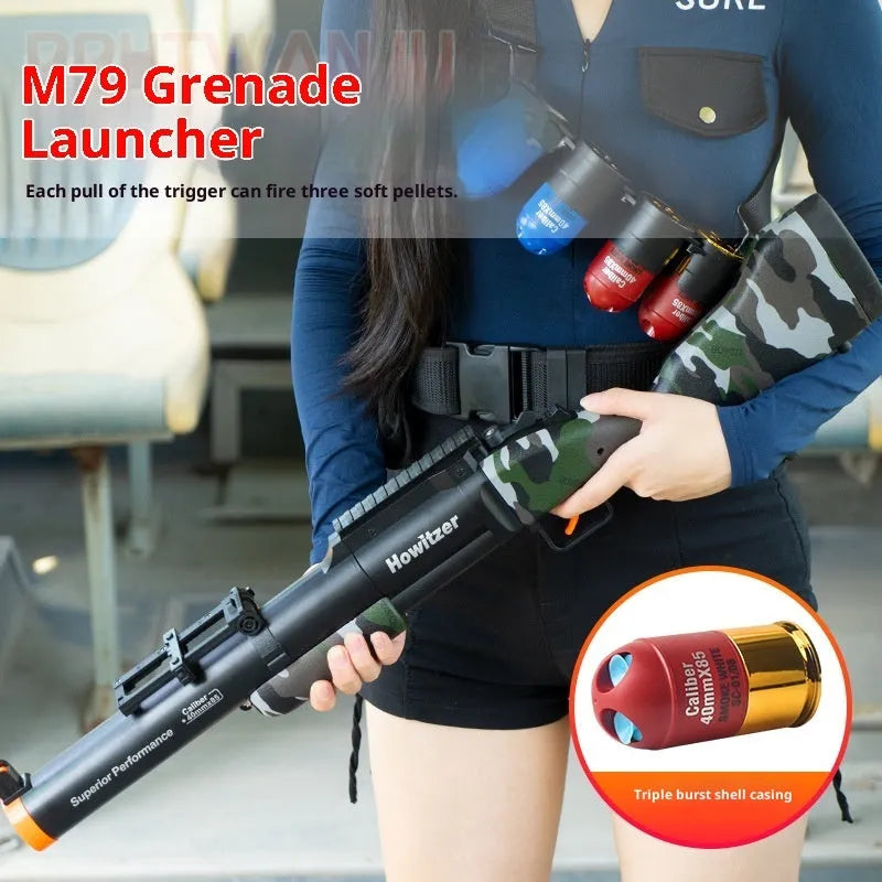 Three-piece Golden Ring Howitzer children's toy soft bullet gun set with plastic construction, includes gun, 20 bullets, and sling
