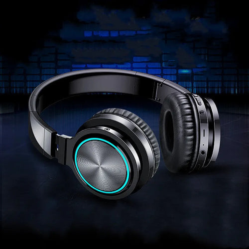 B12 wireless folding Bluetooth headset in black, shown in both open and folded positions