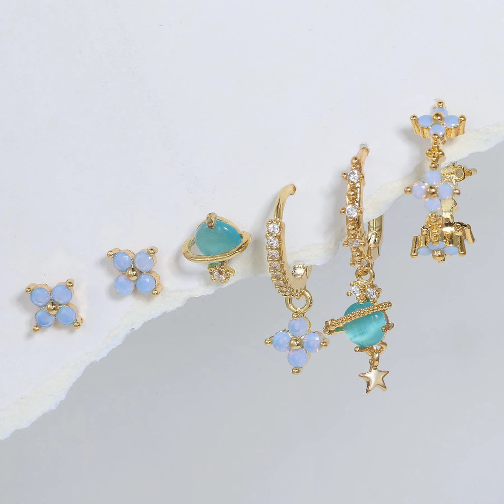 Blue protein colour flower nail design earrings with zircon accents in gold and silver options