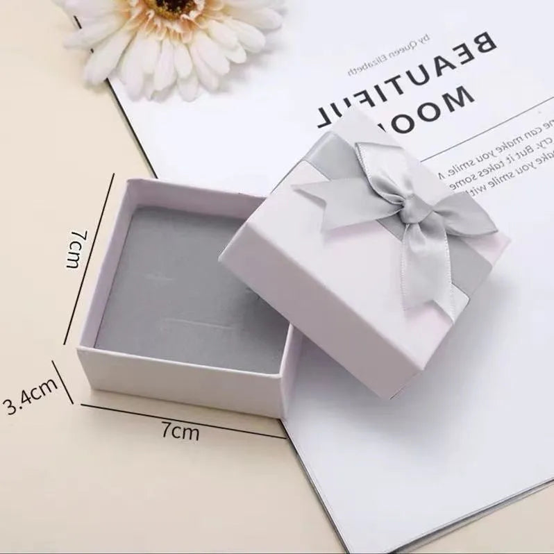 Handmade women's Hetian Jade Rabbit bracelet with glass rabbit charms in a gift box.