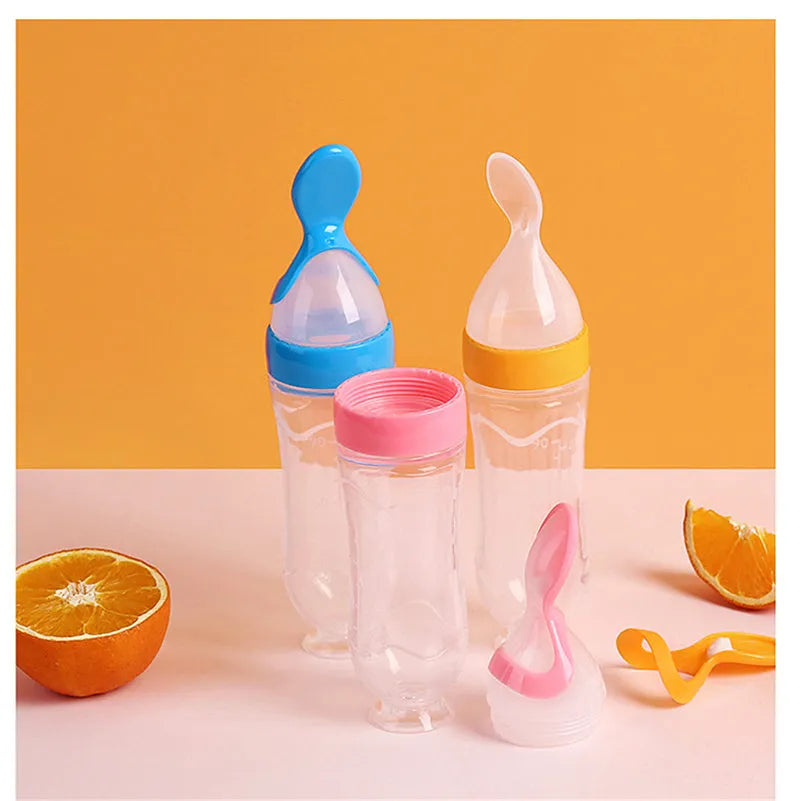 Clear disposable 18 oz paper drinking cup with a blue coloured lid on a table.