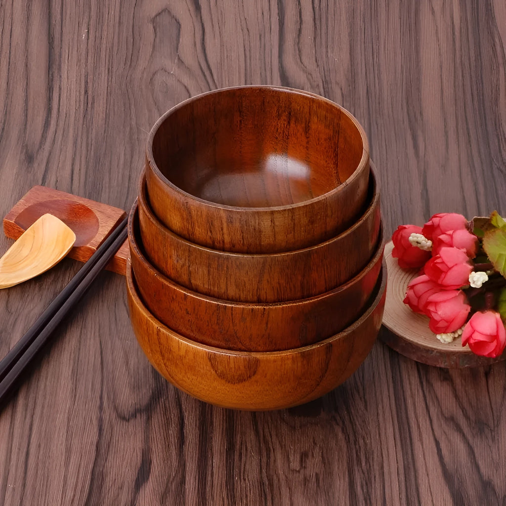 Set of four round wooden bowls in natural wood colour from 10x6.5cm to 11.8x6.7cm