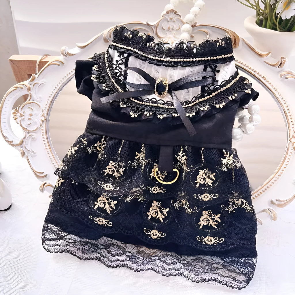 Golden gothic-style skirt dress for cats or dogs on a mannequin showing princess design and polyester fabric