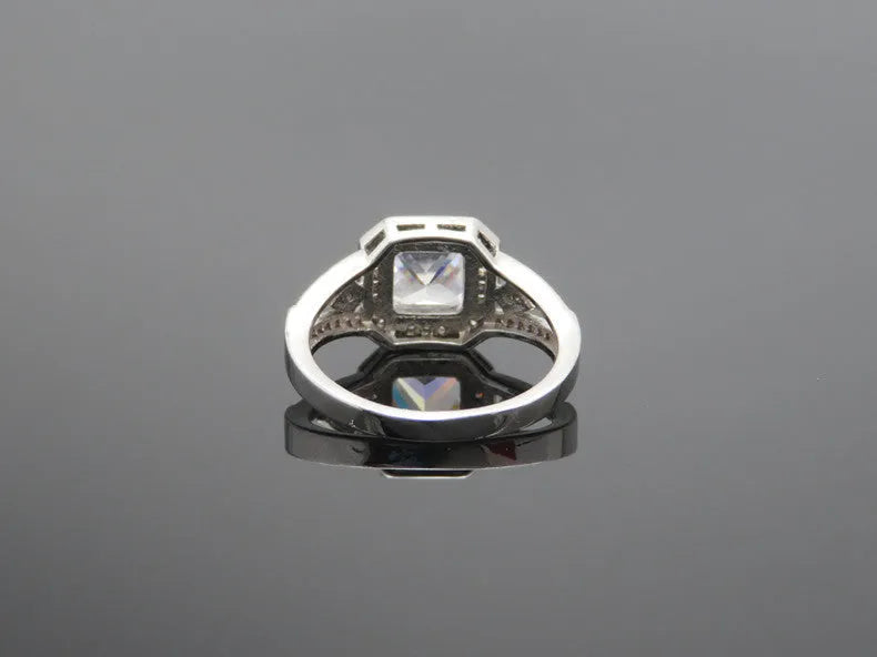 Geometric zircon women's ring with hollow ornament design in platinum colour