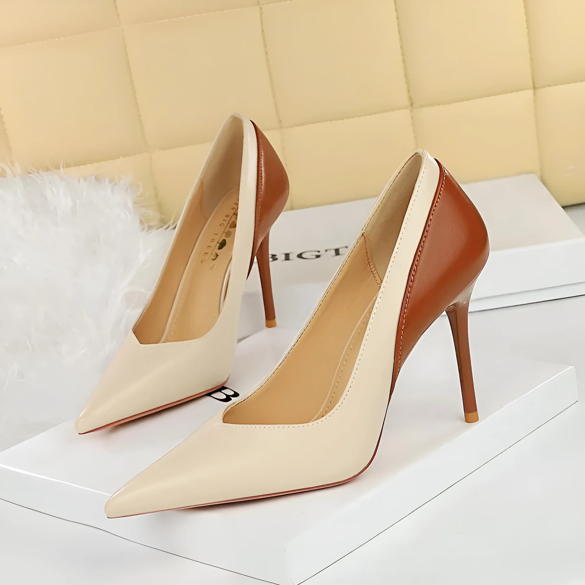 Retro style women's stiletto high heels in black or creamy-white with pointed toe and super high heel
