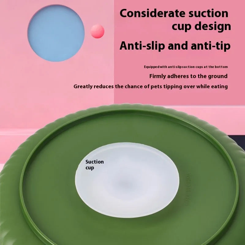 Slow feeder dog bowl with rotating game board and textured silicone licking mat insert.