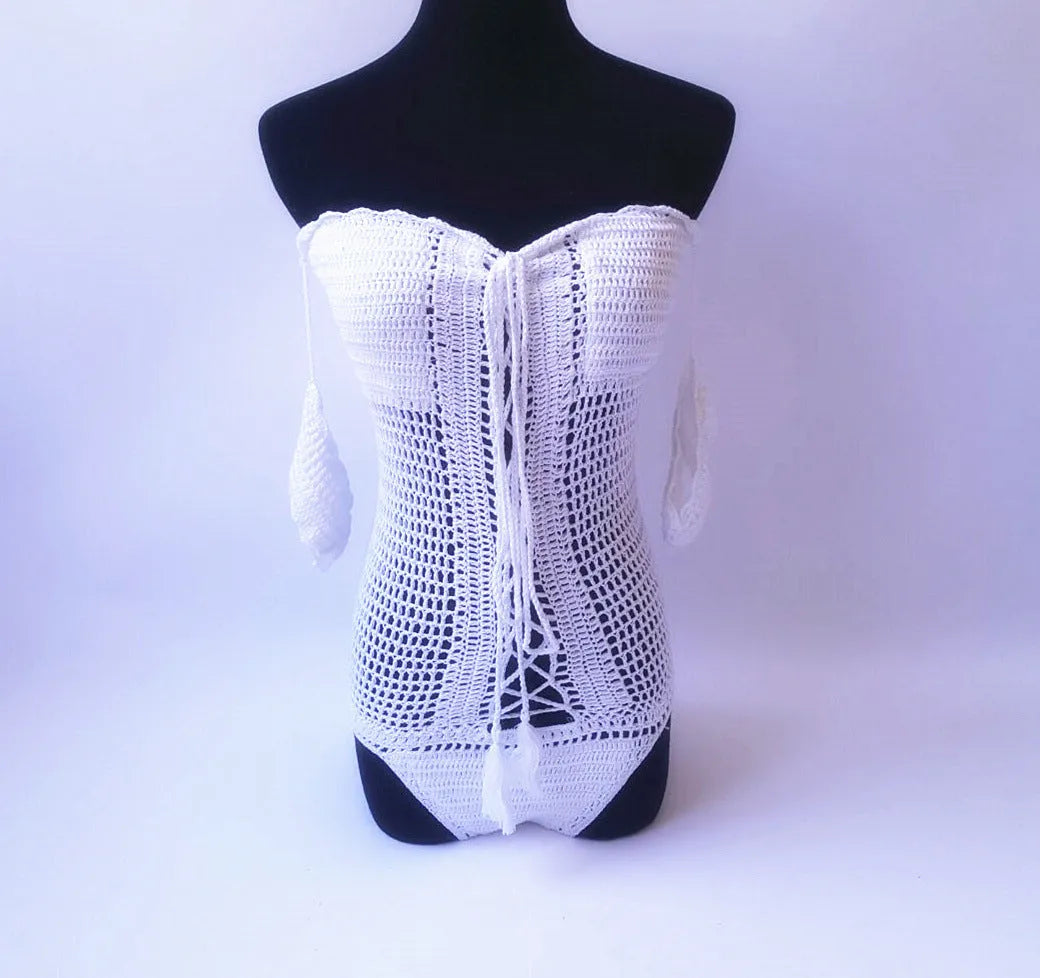 Off-shoulder one-piece swimsuit in light pink on a mannequin