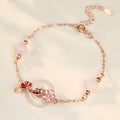 S925 sterling silver bracelet with white chalcedony crystals and a floral koi design.