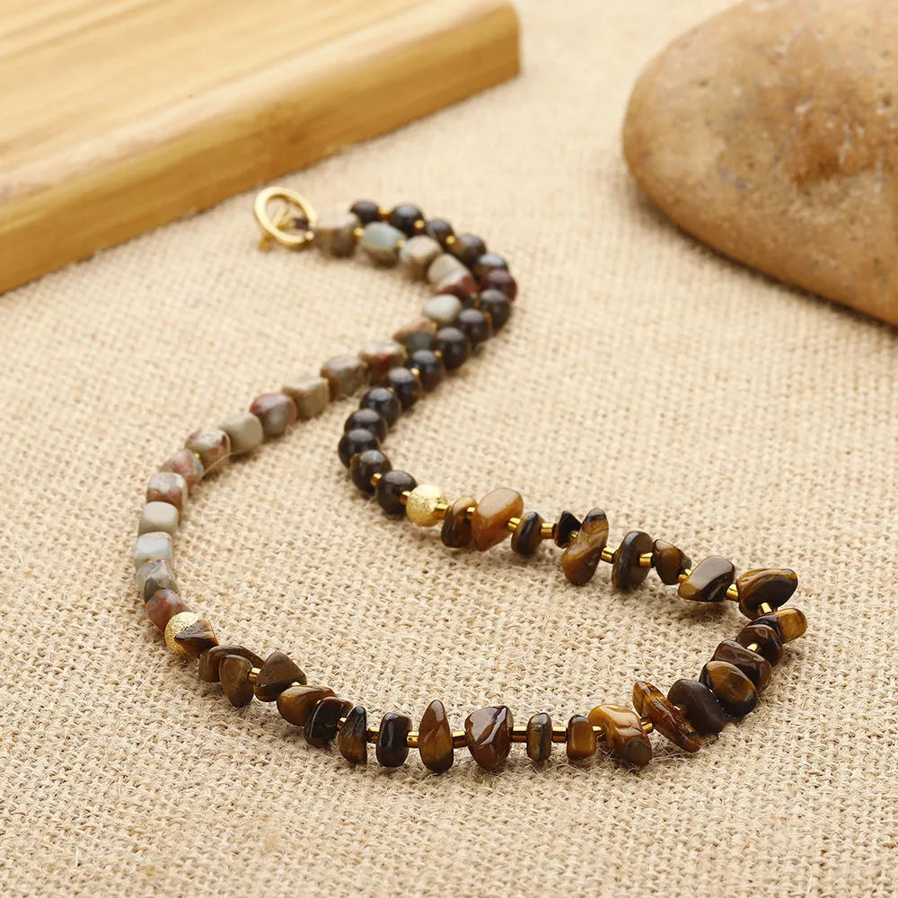 Brown Tigereye stone bracelet with bronze Glow Ball geometric charm
