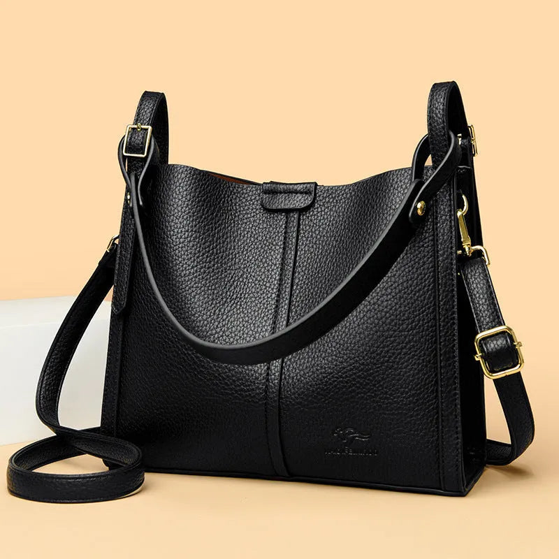 Brown retro ladies shoulder bag with zip compartments showing vertical square shape and single strap