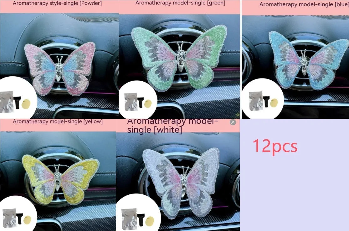 Fabric embroidered butterfly car air vent decoration in multiple colour options on a dashboard.