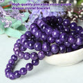 Natural transparent charoite crystal bracelet with platinum metal accents in hands bead design