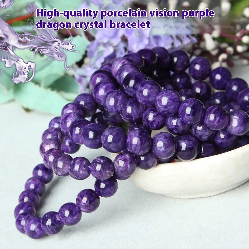 Natural transparent charoite crystal bracelet with platinum metal accents in hands bead design