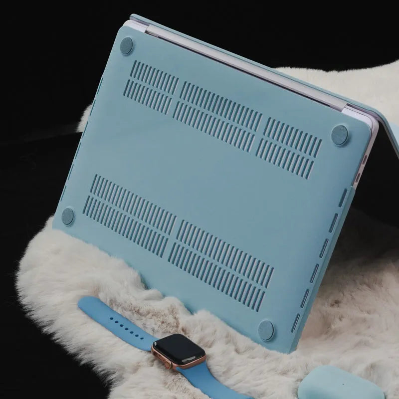 Dream Blue 16 inch laptop sleeve with colourful sticker-style print, open showing inner lining