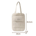 Unisex 15-inch laptop bag in beige with waterproof polyester exterior and baby velvet lining, urban simplicity style