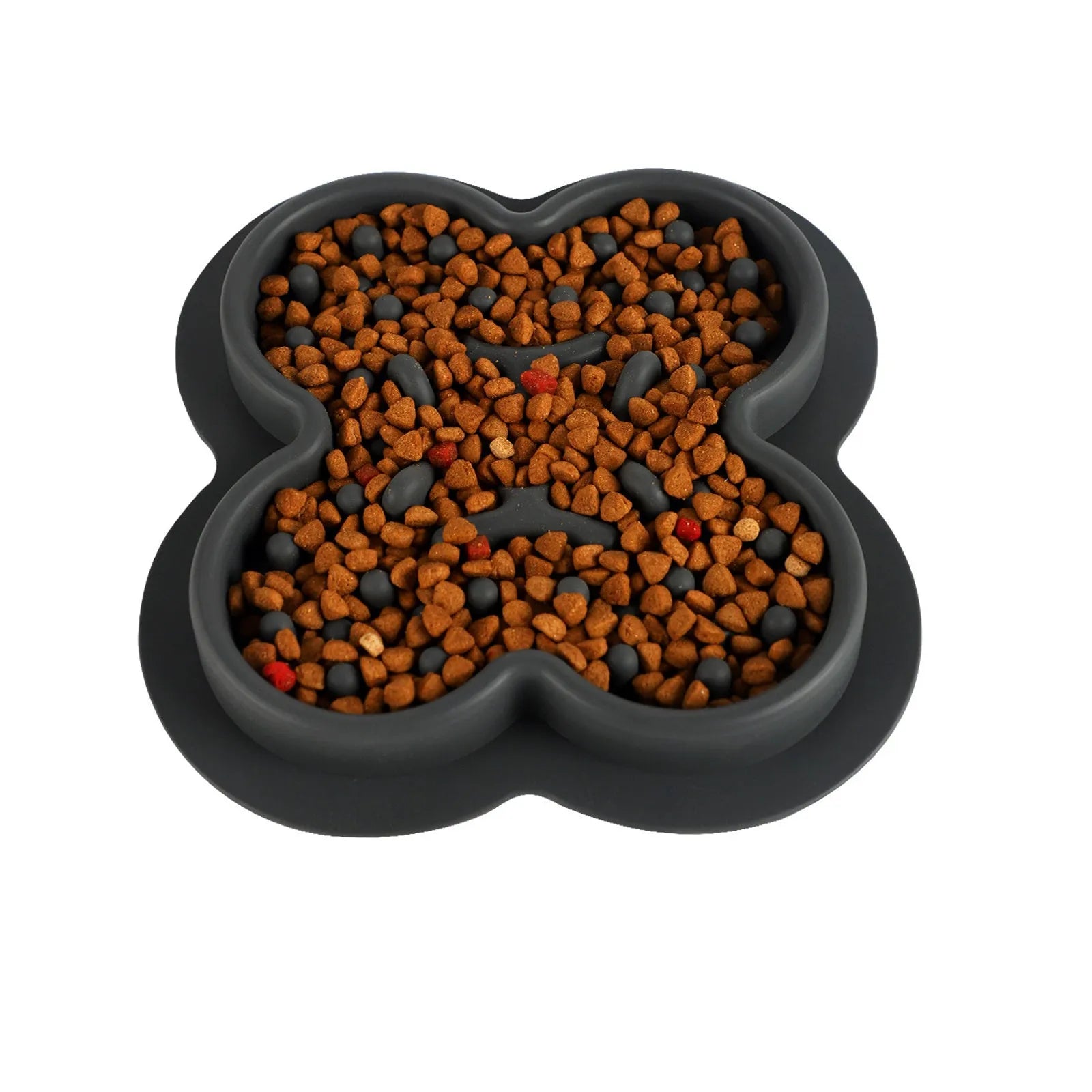Silicone slow feeder licking pad for pets in various colours on a kitchen counter.