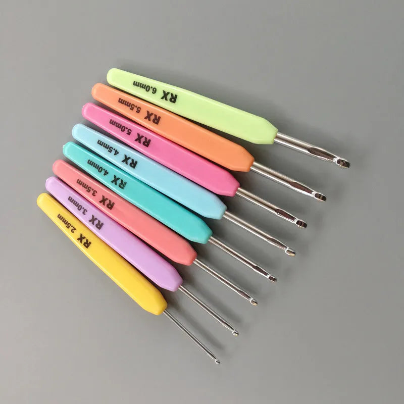 Complete set of 16 crochet hooks with soft and hard handles, sizes 1.0mm to 6.0mm, inside a grey PU storage bag.