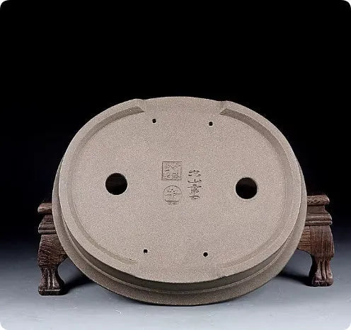 Handmade purple sand ceramic oval bonsai pot measuring 25cm by 21cm