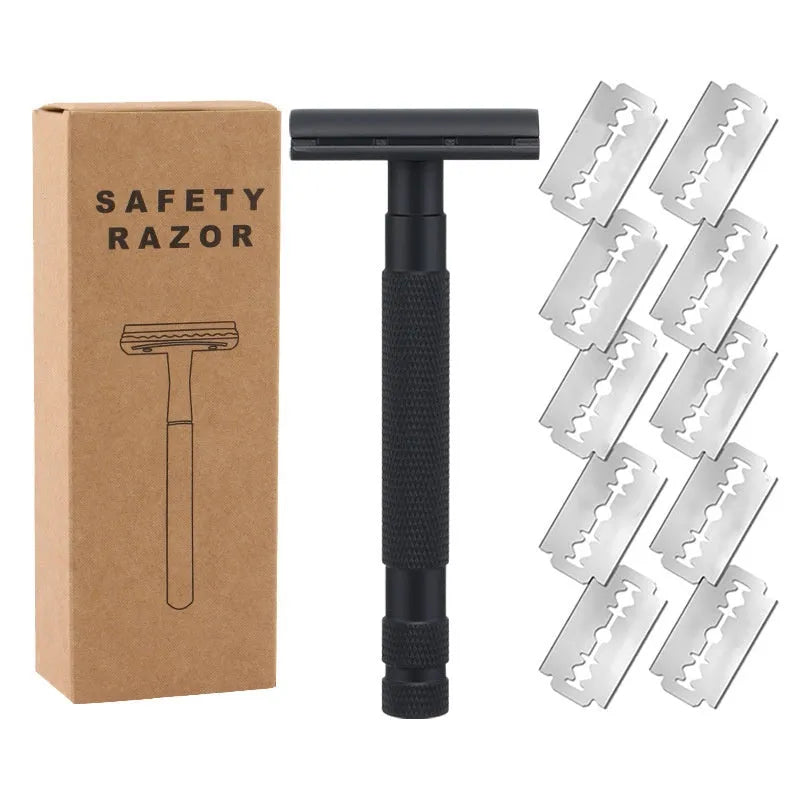 Manual double-sided safety razor with alloy handle, shown with replacement blades on a towel.