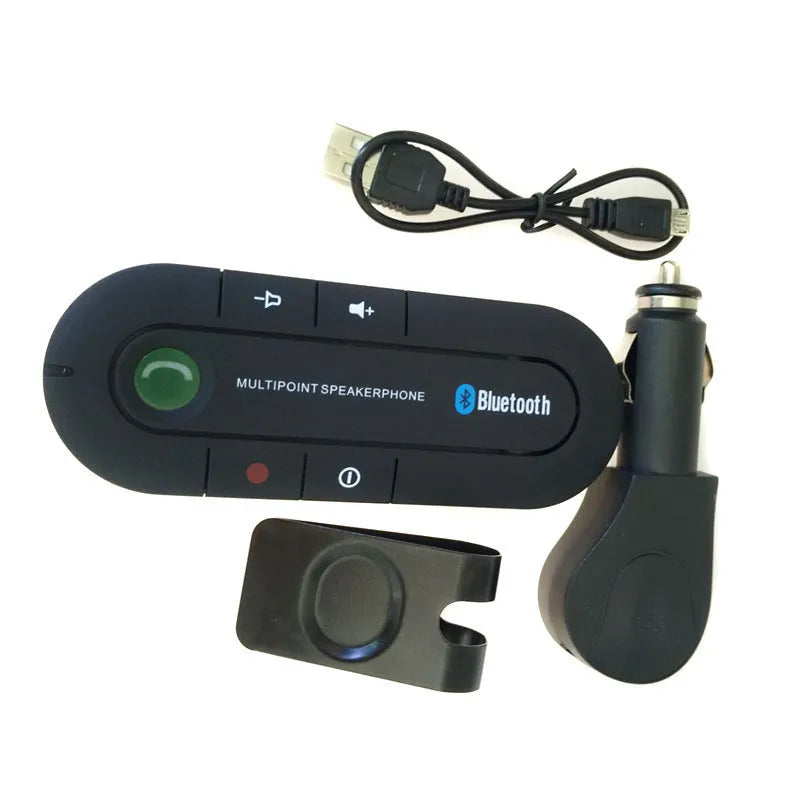 Car Bluetooth handsfree unit mounted on sun visor with charger and cable