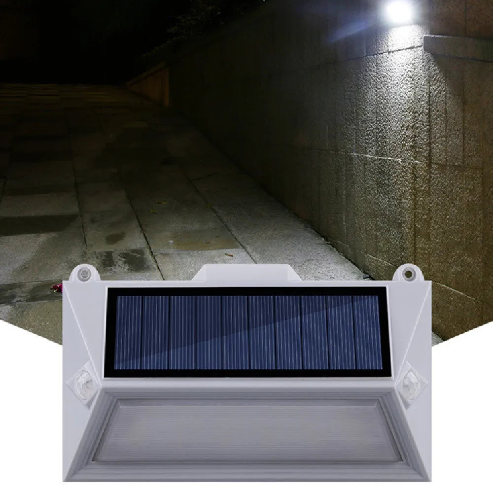 Solar outdoor human body induction step light with abstract design for pathway and stair illumination