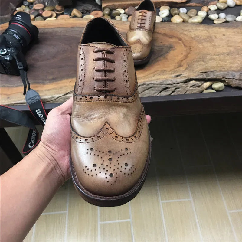 Men's light brown vintage carved leather casual shoes with distressed finish and lace-up design